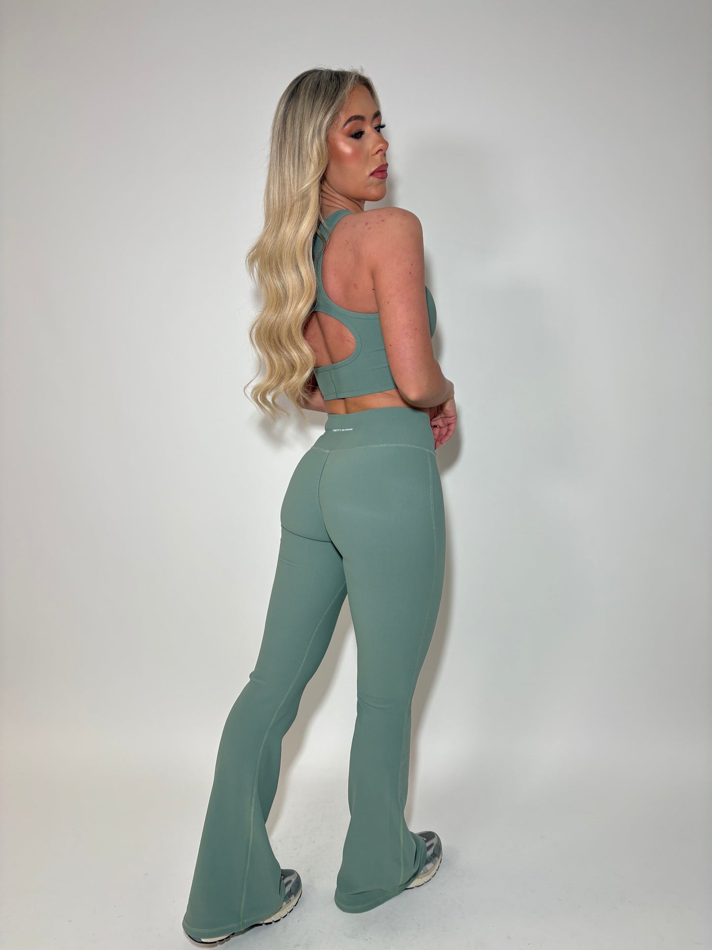 GYM GIRL ERA EXCLUSIVE Sage green sculpt V waist flared bottoms
