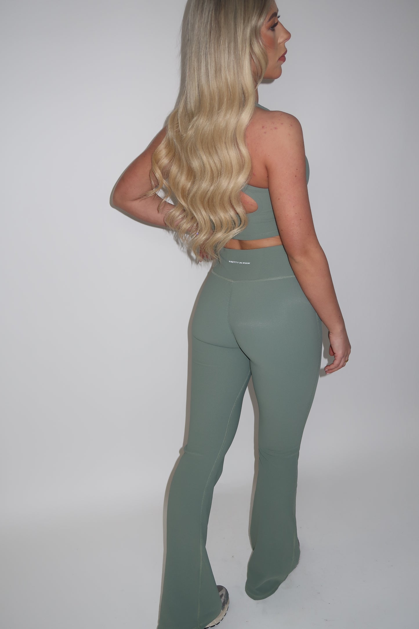 GYM GIRL ERA EXCLUSIVE Sage green sculpt V waist flared bottoms