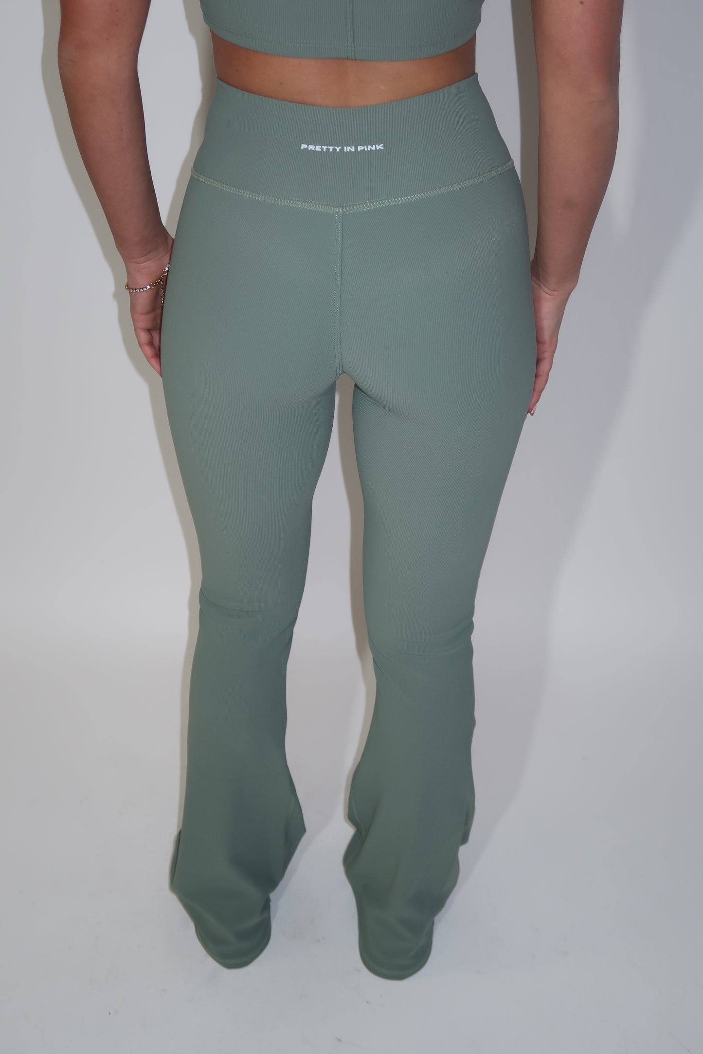 GYM GIRL ERA EXCLUSIVE Sage green sculpt V waist flared bottoms