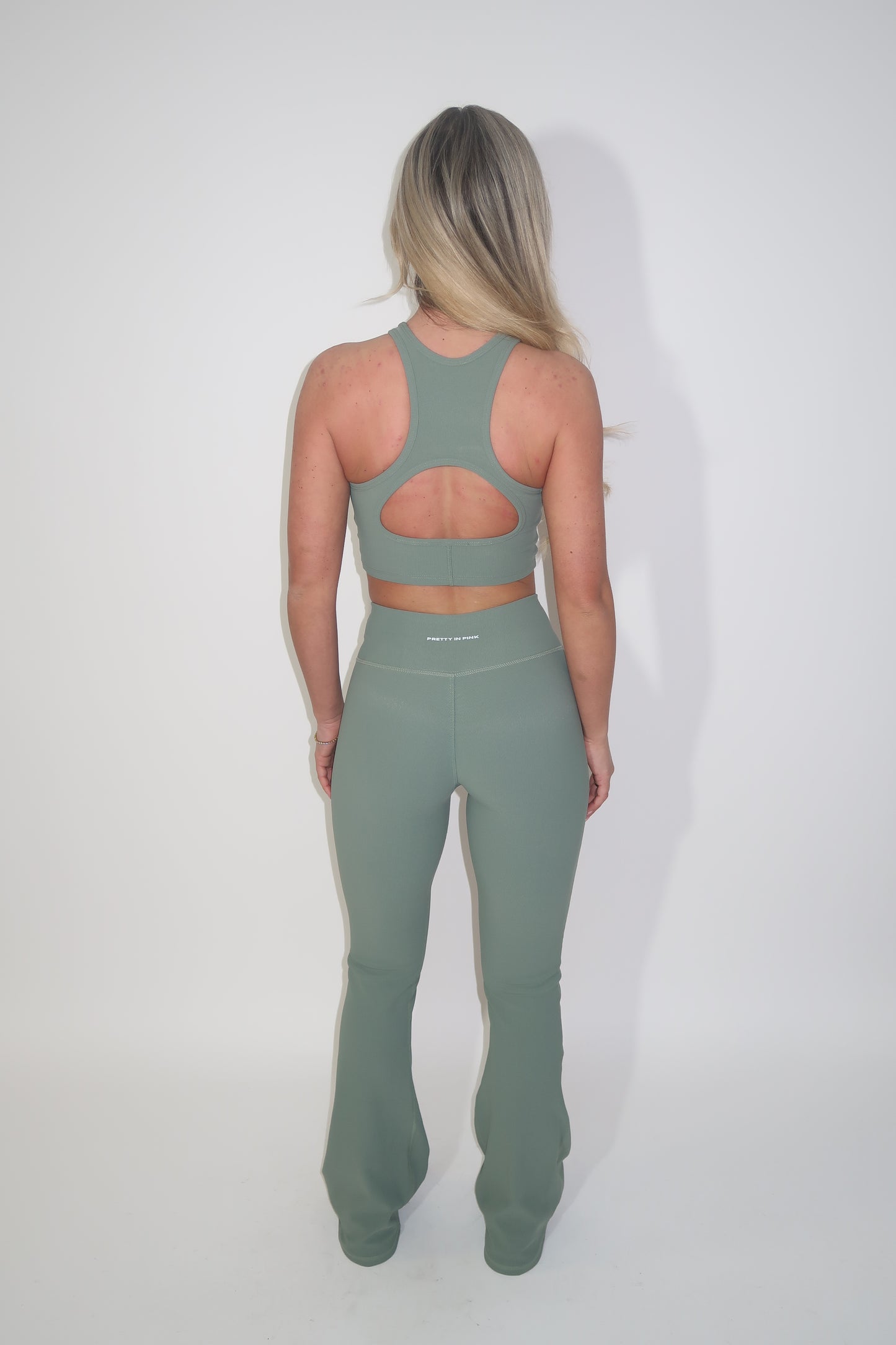 GYM GIRL ERA EXCLUSIVE Sage green sculpt V waist flared bottoms
