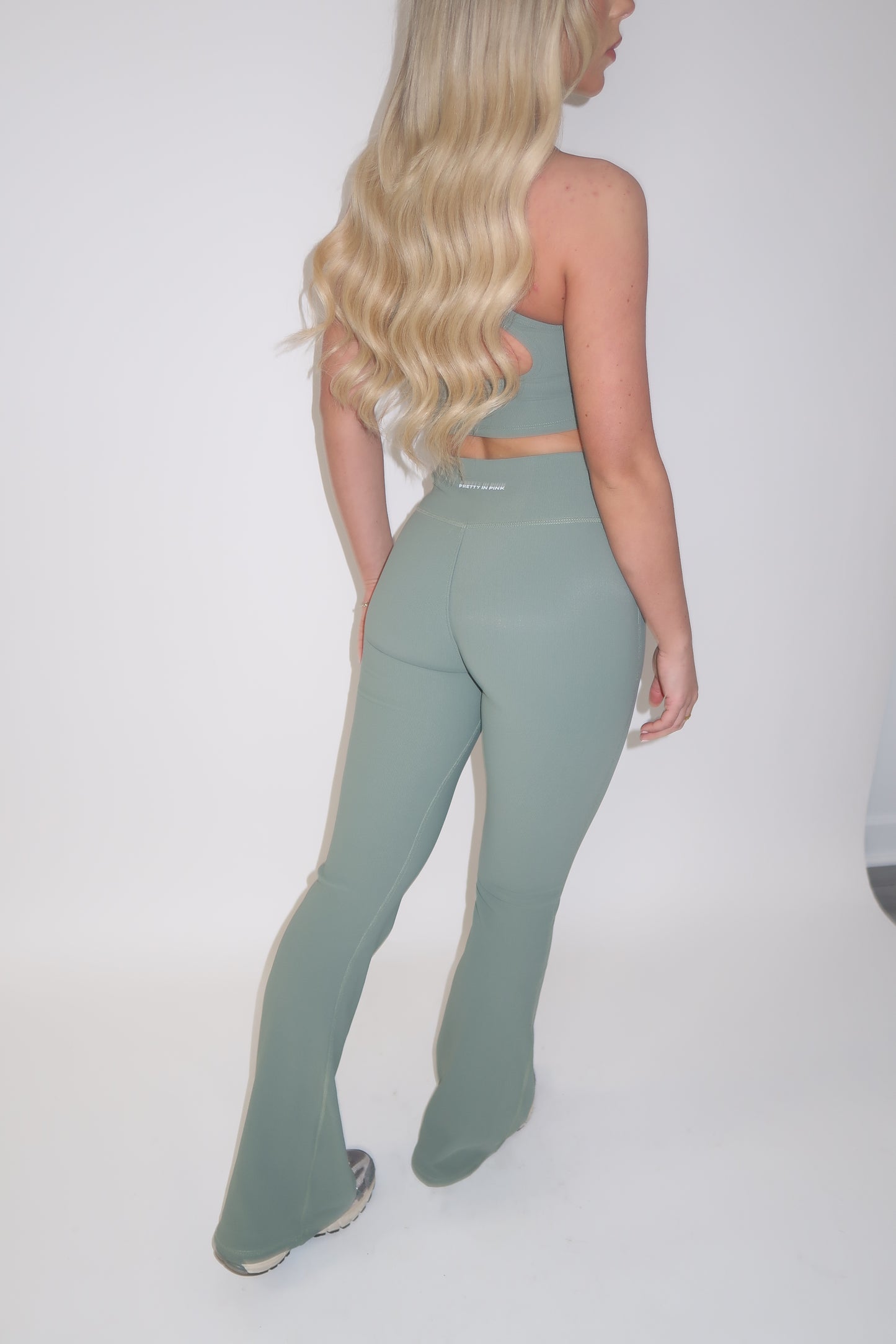 GYM GIRL ERA EXCLUSIVE Sage green sculpt V waist flared bottoms