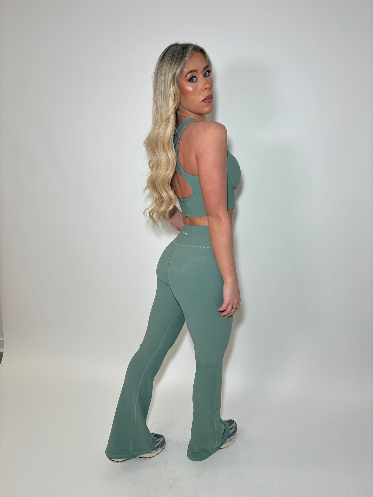 GYM GIRL ERA EXCLUSIVE Sage green sculpt V waist flared bottoms