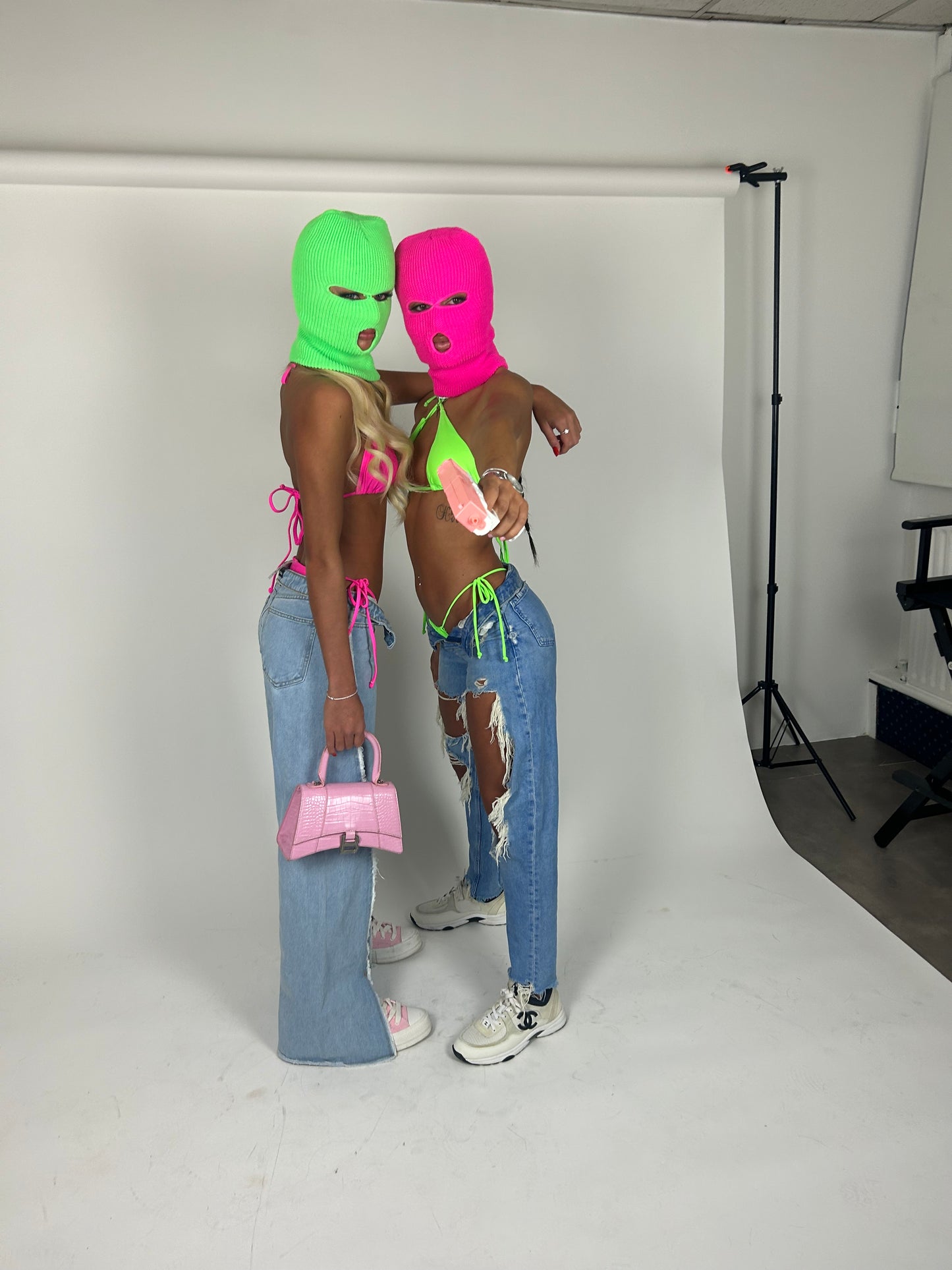 Pink balaclava and green top