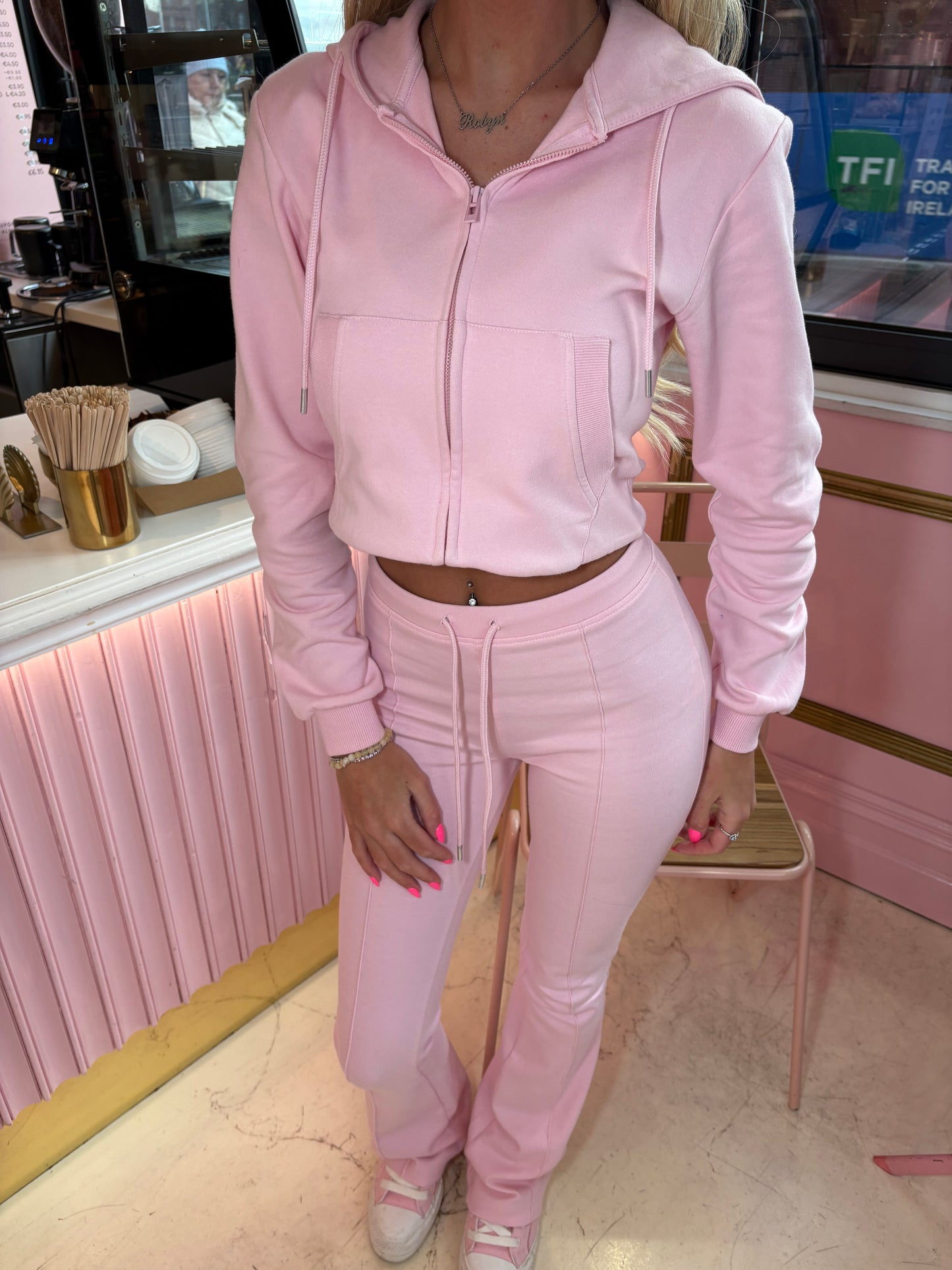 Pink cropped zip hoodie and bell bottom trouser set