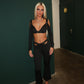 Black buckled top and flared bottoms co-ord
