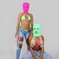 Pink balaclava and green top