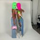 Pink balaclava and green top