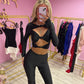 Black slinky cut out top and flared bottoms